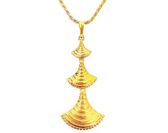 May include: A gold-toned necklace featuring a rope chain and a pendant composed of three stacked, fan-shaped elements. Each tier of the pendant displays a ribbed, textured surface with a scalloped bottom edge, creating a tiered, vertical design.