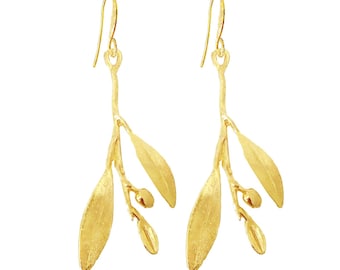 May include: Gold-tone earrings with a delicate branch design featuring leaves and small berries.