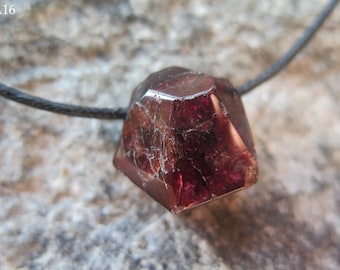 Magic Pyrop/Garnet with side drilling, incl. black cotton cord -different variations-