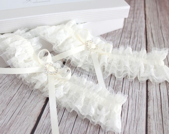 ivory lace and tulle wedding garter set with crystal heart charm, ivory wedding garter set, ivory tulle garter set, ivory bridal garter set