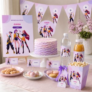 May include: A party table set featuring purple and white decorations with cartoon character graphics. Includes a frosted cake, a sign reading BENVENUTI ALLA FESTA DI GIADA 5 ANNI, a water bottle, juice, popcorn, cookies, macarons, and bunting flags.