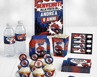 May include: A Spider-Man themed party set including a banner spelling ANDREE, a welcome sign for Andrea 8 Anni, water bottles, popcorn boxes, cupcakes with toppers, food labels, and napkins, all featuring red, blue, and white superhero graphics.