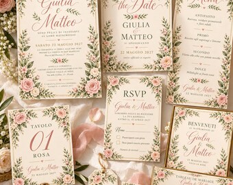 May include: A wedding stationery set featuring cream-colored paper with floral borders of pink roses and green leaves. The cards include text for a wedding invitation, Save the Date, menu, RSVP, table number, welcome sign, seating chart, and place card, all printed in elegant script and serif fonts.