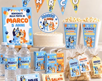 May include: A party decoration set featuring Bluey and Bingo characters with the text Marco 5 Anni. Includes a welcome sign, cake topper, popcorn boxes, water bottle labels, juice box wraps, favor tags, and food labels with the text Dolce and Salato.