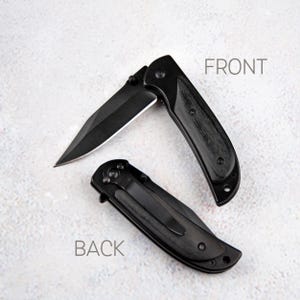 a knife and a pocket knife on a white surface