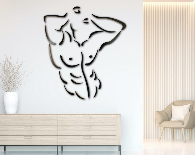 Abs: Wall mounted wood sculpture of man with well defined abdominal muscles