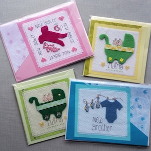 Bundels van vreugde - Voltooide kruissteekbabykaarten