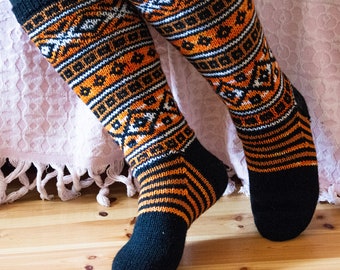 Hand knitted wool socks, knee length, black, orange, striped, long