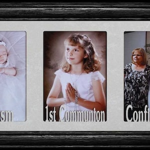 May include: A triple photo frame with black wood trim and a white mat. The frame has three openings, each with a different photo. The left opening shows a baby in a white gown, the middle opening shows a young girl in a white dress, and the right opening shows a young woman and a man. The text "Baptism", "1st Communion", and "Confirmation" is printed below each opening.