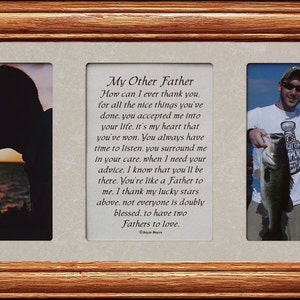 May include: A framed collage with three photos. The left photo shows a silhouette of a couple kissing at sunset. The right photo shows two people holding a fish. The middle photo contains a poem about a father figure.