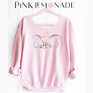 DUMBO. Dumbo Sweatshirt. Off shoulder sweatshirt. Dumbo sweater. Disney sweater. Made by Pink lemonade apparel.