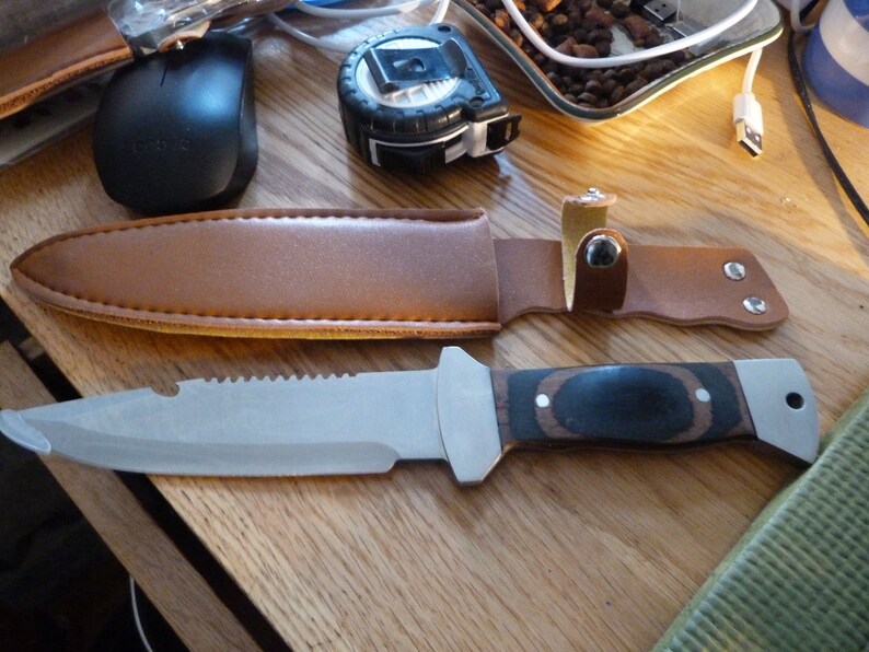 A bowie type sheath knife with leather belt holder Etsy