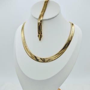 Halsband med fiskbensmönster i guld: 14k tungpläterat guld, 9 mm bredd, livstidsgaranti