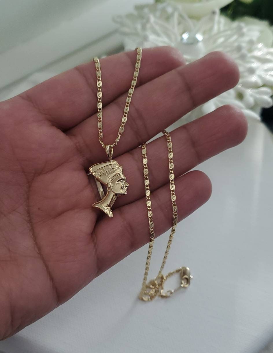 African shop queen pendant