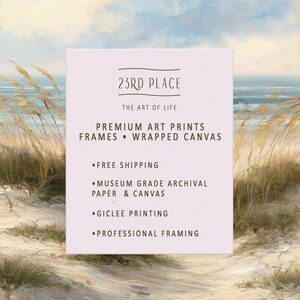 May include: A rectangular sign with a light pink background featuring the text 23RD PLACE THE ART OF LIFE PREMIUM ART PRINTS FRAMES WRAPPED CANVAS MUSEUM GRADE ARCHIVAL PAPER & CANVAS GICLEE PRINTING PROFESSIONAL FRAMING over a beach painting.