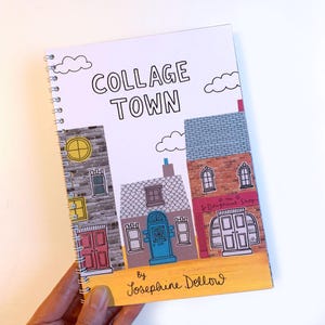 May include: Spiral-bound notebook with the title "Collage Town" and a colourful illustration of cartoon houses. The cover features a blue door, brick walls, and the text "By Josephine Dellow". The notebook is held by a hand.