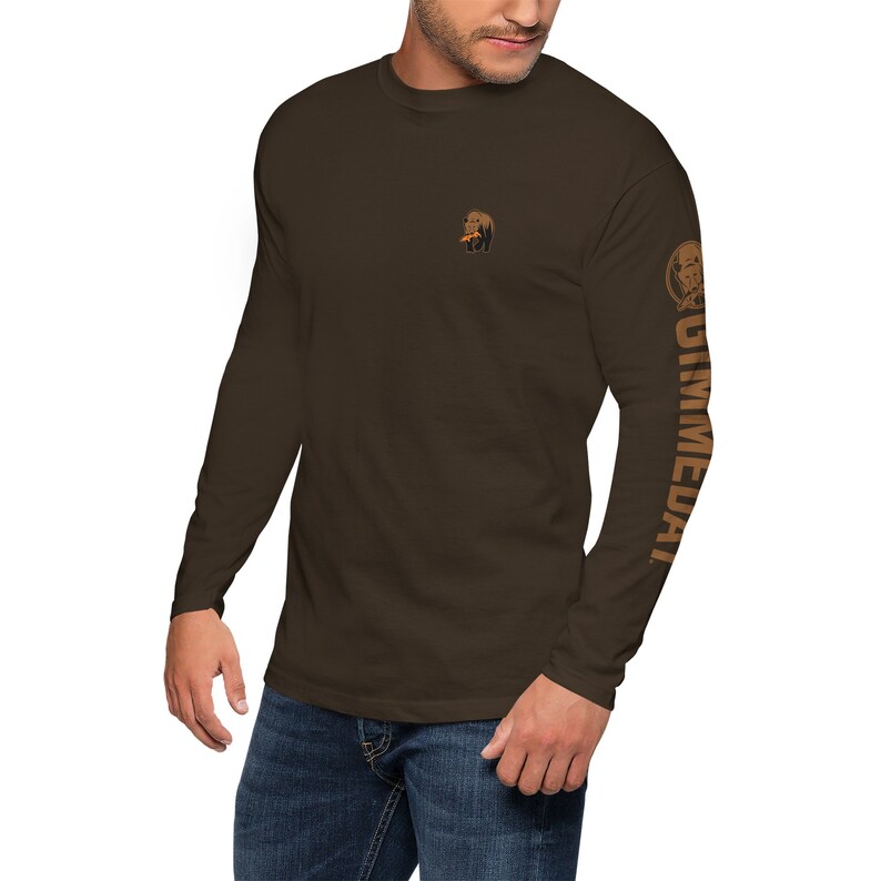May include: A brown long-sleeve shirt with a small graphic of a bear on the left chest and the word "GIMMEDAT" printed vertically on the right sleeve.