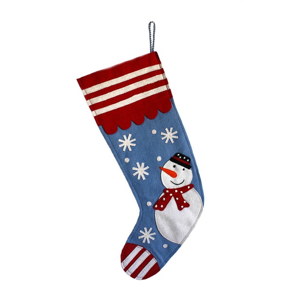 Blue wool snowman stocking with red and white stripes and falling snow