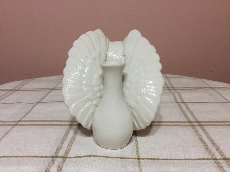 Cherub Angel Sitting Bisque Figurine