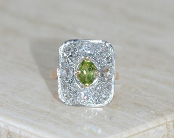 Old rectangle ring, diamonds and peridot on pink gold and platinum