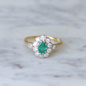 Emerald daisy ring and diamonds on gold