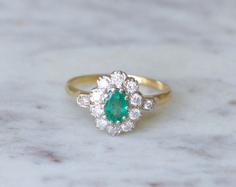 Emerald daisy ring and diamonds on gold