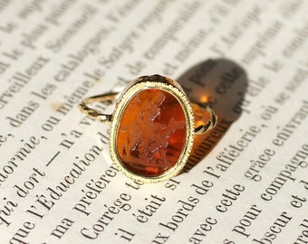 Old ring, intaglio on glass and yellow gold
