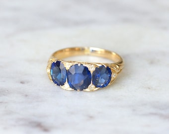 Antique sapphire and diamond garter ring in yellow gold