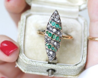 Antique marquise ring with emeralds and diamonds in gold and silver