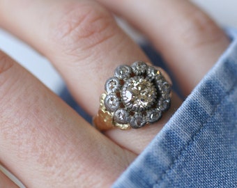 Antique gold and silver daisy engagement ring with diamonds