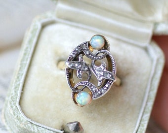 Old diamond and opal scroll ring