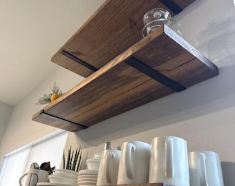 Sturdy Iron Reversible Brackets support this solid pine floating shelf.