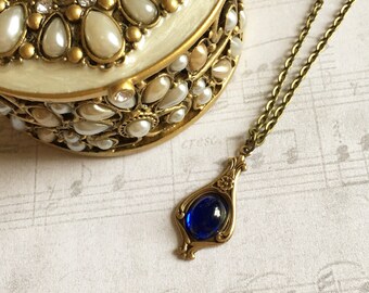 Magnifique pendentif en c/éramique /„crocodile/“ marbr/é de bleu; Collier cha/îne de bijoux cadeau pendentif artisanat poterie Amulette porte-bonheur