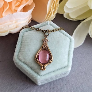 Victorian Pink Cabochon Necklace: Oxidized Brass Floral Pendant