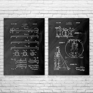 May include: Two framed black and white patent prints. The left print shows diagrams of a device, dated January 31, 1967. The right print shows a drum set diagram, dated July 7, 1959. Both prints are displayed against a white brick wall.