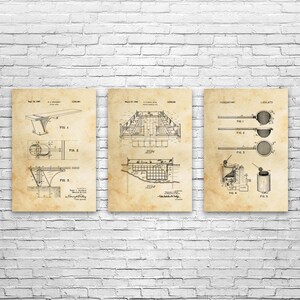 May include: Three vintage-style prints featuring technical drawings on aged paper. The prints depict diagrams of a diving board, a swimming pool, and kitchen tools. The drawings are in black ink, set against a beige background, and framed by a white brick wall.