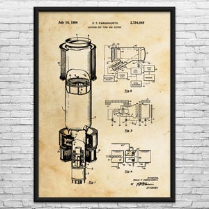 May include: Black framed print of a cathode ray tube and system patent illustration. The print includes technical diagrams, the date July 10, 1956, and the name P.T. Farnsworth. The patent number is 2,754,449.