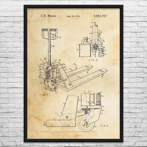 May include: A framed patent print of a pallet jack, dated September 28, 1976, with the patent number 3,982,767. The print features detailed technical drawings of the pallet jack's components, including wheels, forks, and a lifting mechanism. The background is a sepia tone.