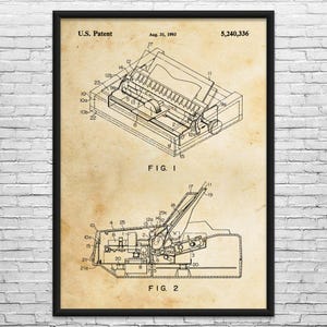 May include: A framed patent illustration of a typewriter, dated August 31, 1993. The black and white technical drawing shows two detailed views of the machine, labeled as Fig. 1 and Fig. 2, with various numbered parts. The background has a vintage, aged paper appearance.