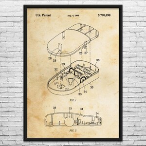 May include: A framed patent illustration of a computer mouse, dated August 4, 1998, with the patent number 5,790,098. The diagram shows the mouse's internal components and design in detail, with labels and figures.