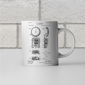May include: Black and white illustration of a patent for an electric bell, patent number 501,392, patented July 11, 1903. The illustration shows a detailed diagram of the bell's internal workings.