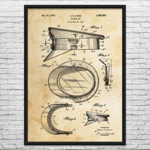 May include: A framed vintage patent print of a uniform cap, dated January 31, 1933. The print features detailed technical drawings and diagrams of the cap's design, including various views and cross-sections. The patent number is 1,895,593.