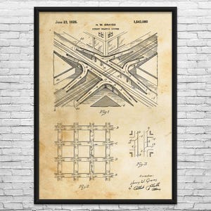 May include: A framed vintage print of a street traffic system diagram, dated June 23, 1925. The black and white technical drawing shows an intersection with multiple lanes and overpasses, along with additional diagrams.