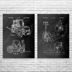 May include: Two framed patent prints of forklifts. The left print shows two forklift designs, labeled Fig. 1 and Fig. 2, with the text "U.S. Patent" and "Des. 338,764". The right print shows forklift diagrams with the text "U.S. Patent" and "3,982,767".