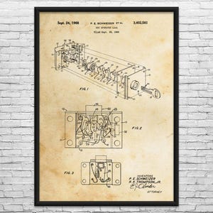 May include: A framed vintage patent print of a key-operated lock, dated September 24, 1968. The print features detailed technical drawings labeled as Fig. 1, Fig. 2, and Fig. 3, with the inventors' names and patent number.