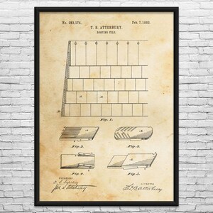 May include: Framed vintage patent print of a roofing tile design by T. B. Atterbury, dated February 7, 1882. The sepia-toned print features detailed diagrams and technical drawings of the tile, with the patent number 253,174.
