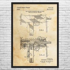 May include: Patent print of a bolt handle and pistol grip magazine for an automatic firearm, dated March 28, 1972. The black and white technical drawing shows two detailed diagrams of the firearm's components, with labels and measurements. The print is framed.