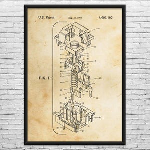 May include: A framed patent diagram of a mechanical keyboard switch, dated August 21, 1984. The diagram, labeled "FIG. 1," shows an exploded view of the switch's internal components, including springs and housing, in black ink on a tan background.