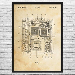 May include: A framed print of a U.S. patent diagram for a circuit board, dated October 9, 2001. The diagram, labeled "FIG. 1," features detailed technical illustrations of the board's components, including numbered elements and text. The print has a vintage, aged paper appearance.