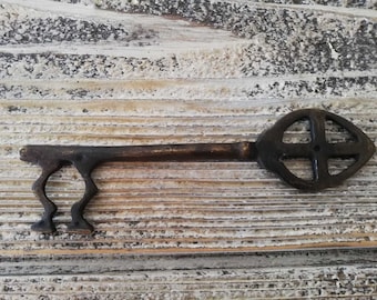 Antique old style big church gate key vintage shabby metal church symbol